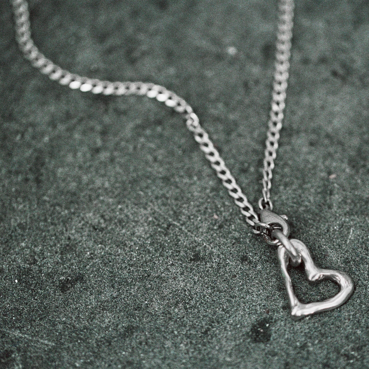 MELTED HEART LANKY PENDANT